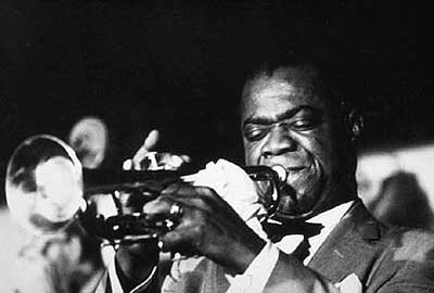 Louis Armstrong performing at the Basin Street Club. 